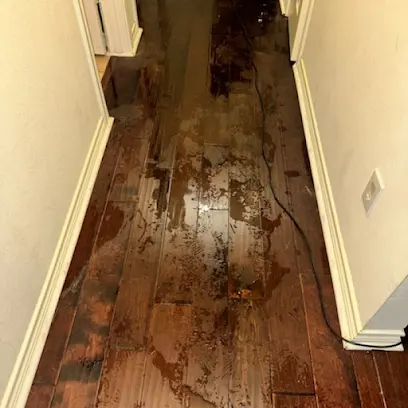Slab leak dried under a Devonshire hardwood floor